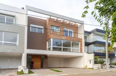 Casa em condomínio fechado com 3 quartos à venda na rua ivo walter kern, 599, hípica, porto alegre por r$ 1.670.000