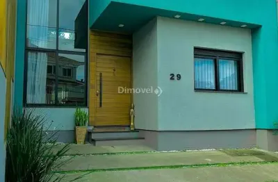 Casa em condomínio fechado com 3 quartos à venda na rua carlos maximiliano fayet, 430, hípica, porto alegre por r$ 739.000