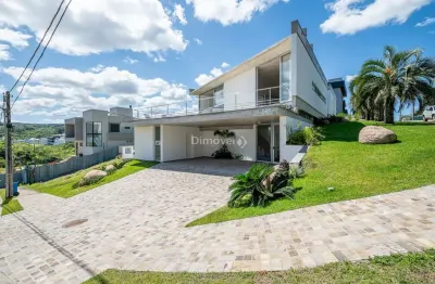 Casa em condomínio fechado com 4 quartos à venda na Estrada das Três Meninas, 1400, Vila Nova, Porto Alegre por R$ 3.490.000
