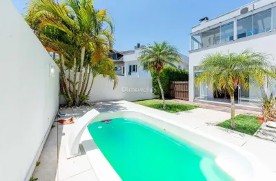 Casa em condomínio fechado com 3 quartos à venda na avenida edgar pires de castro, 540, hípica, porto alegre por r$ 949.000