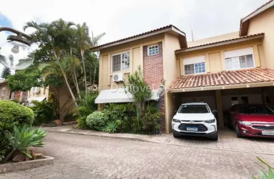 Casa em condomínio fechado com 3 quartos à venda na rua doutor armando barbedo, 832, tristeza, porto alegre por r$ 850.000