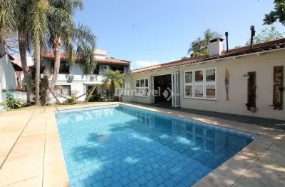Casa com 4 quartos à venda na travessa pedra redonda, 130, jardim isabel, porto alegre por r$ 1.950.000