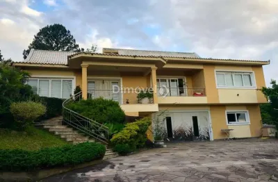Casa com 4 quartos à venda na rua morro alto, 155, campo novo, porto alegre por r$ 850.000