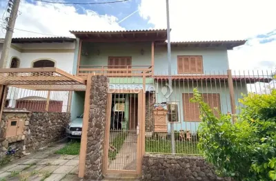 Casa com 4 quartos à venda na rua mário assumpção, 15, guarujá, porto alegre por r$ 750.000
