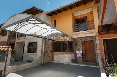 Casa em condomínio fechado com 2 quartos à venda na avenida edgar pires de castro, 1286, hípica, porto alegre por r$ 370.000