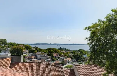Casa em condomínio fechado com 4 quartos à venda na rua padre joão batista reus, 983, vila conceição, porto alegre por r$ 950.000