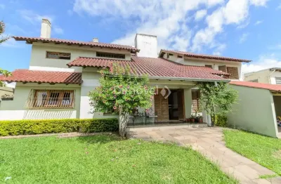 Casa com 3 quartos à venda na travessa nova trento, 354, tristeza, porto alegre por r$ 1.400.000