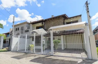 Casa com 4 quartos à venda na rua adão pinheiro da silva, 420, ipanema, porto alegre por r$ 1.130.000