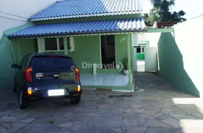 Casa com 3 quartos à venda na avenida eduardo prado, 108, cavalhada, porto alegre por r$ 550.000