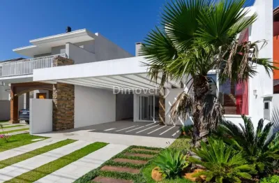 Casa em condomínio fechado com 5 quartos à venda na avenida juca batista, 8000, belém novo, porto alegre por r$ 2.250.000