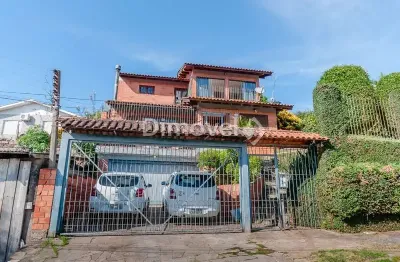 Casa com 5 quartos à venda na rua joão ribeiro de barros, 220, espírito santo, porto alegre por r$ 450.000