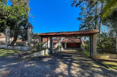 Casa com 5 quartos à venda na avenida arlindo pasqualini, 765, jardim isabel, porto alegre por r$ 1.300.000