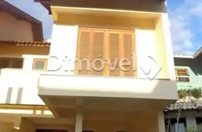 Casa em condomínio fechado com 3 quartos à venda na rua pau brasil, 778, hípica, porto alegre por r$ 425.000