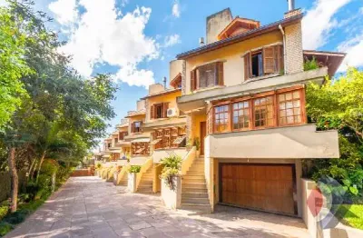 Casa em condomínio fechado com 4 quartos à venda na rua padre joão batista reus, 438, tristeza, porto alegre por r$ 1.490.000