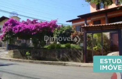 Casa com 5 quartos à venda na rua ângelo passuelo, 79, vila nova, porto alegre por r$ 650.000