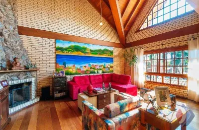 Casa com 3 quartos à venda na rua padre joão batista reus, 629, tristeza, porto alegre por r$ 1.100.000