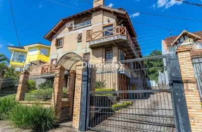 Casa em condomínio fechado com 3 quartos à venda na rua doutor arnaldo da silva ferreira, 35, jardim isabel, porto alegre por r$ 900.000