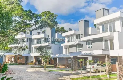 Casa em condomínio fechado com 4 quartos para alugar na avenida coronel marcos, 1239, pedra redonda, porto alegre por r$ 19.000