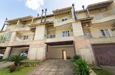 Casa em condomínio fechado com 3 quartos para alugar na avenida coronel marcos, 39, pedra redonda, porto alegre por r$ 4.900