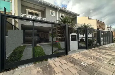 Casa em condomínio fechado com 3 quartos para alugar na rua pau brasil, 490, hípica, porto alegre por r$ 4.650