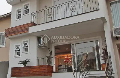 Casa em condomínio fechado com 4 quartos à venda na Rua Deputado Hugo Mardini, 1780, Passo das Pedras, Porto Alegre