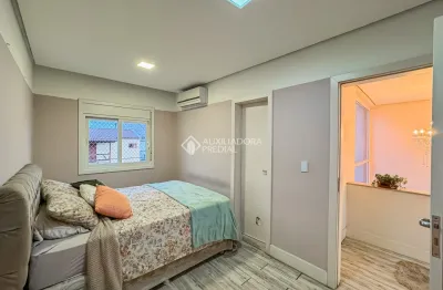 Casa em condomínio fechado com 3 quartos à venda na Rua Deputado Hugo Mardini, 1800, Passo das Pedras, Porto Alegre