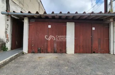 Imóvel à venda no jardim germânia: terreno de 236m² com 3 casas, 2 vagas cobertas e quintal espaçoso. ideal para moradia ou investimento