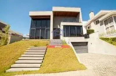 Maravilhosa casa em condomínio com 4 dormitórios , 4 suítes e ofurô em condomínio fechado à venda n