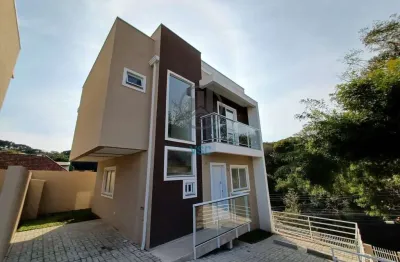 Sobrado novo em condomínio, 3 quartos sendo uma suíte e 2 vagas