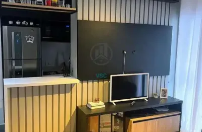 Apartamento mobiliado, 2 quartos sendo uma suíte e vaga coberta