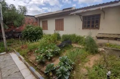 Casa com 4 quartos à venda na rua vitalino batista de andrade, 401, centro, sapucaia do sul por r$ 400.000