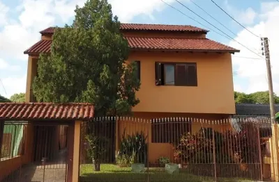 Casa com 3 quartos à venda na major vítor bressane, 147, piratini, sapucaia do sul por r$ 900.000
