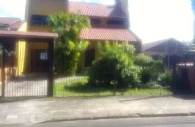 Casa em condomínio fechado com 4 quartos à venda na rua fernando ferrari, 449, piratini, sapucaia do sul por r$ 750.000