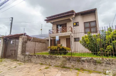 Casa com 4 quartos à venda na rua joão silveira camboim, 57, camboim, sapucaia do sul por r$ 750.000