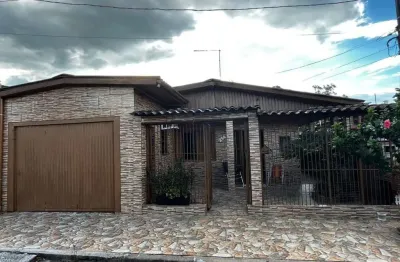 Casa com 3 quartos à venda na Dílio Andreoti, 214, Nova Sapucaia, Sapucaia do Sul por R$ 420.000