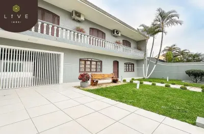 Casa com 4 quartos à venda na rua câmara júnior, 906, jardim das américas, curitiba, 245 m2 por r$ 1.690.000