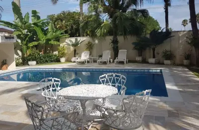 Casa em condomínio fechado com 4 quartos para alugar na avenida kensei tamayose, jardim acapulco, guarujá, 400 m2 por r$ 17.000
