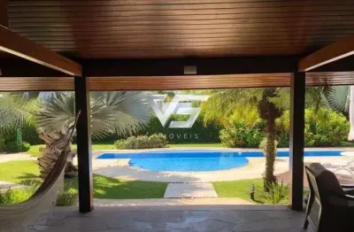 Casa em jurerê com 300m² de área construída terreno de 900m²