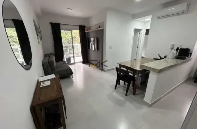 Apartamento praia grande com 2 dormitórios sendo 1 suíte,1 vaga de garagem,varanda gourmet com churrasqueira