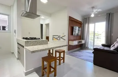 Apartamento praia grande com 2 dormitórios sendo 1 suíte,1 vaga de garagem,varanda gourmet com churrasqueira