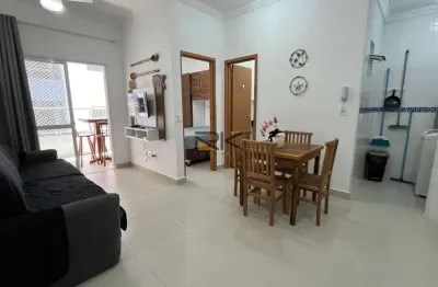 Apartamento à venda nas toninhas com 1 dormitórios, varanda gourmet com churrasqueira e piscina