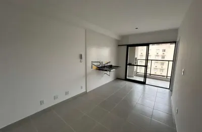 Apartamento nas toninhas com 1 suíte,sala 2 ambientes,varanda gourmet com churrasqueira