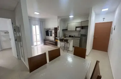 Apartamento praia grande com 2 dormitórios sendo 1 suíte,sala de estar e cozinha