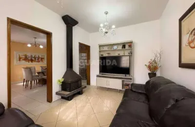 Casa residencial com 4 dormitórios, sendo 1 suíte, no bairro cavalhada