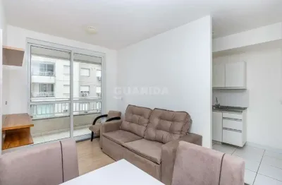 Apartamento com 02 dormitórios, sendo um suíte, mobiliado, e 1 vaga de garagem no bairro humaitá