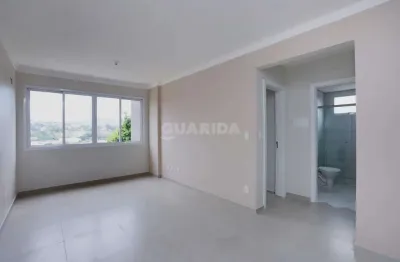 Apartamento com 2 dormitórios, 1 suíte e 2 vagas de garagem no bairro petrópolis