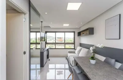 Apartamento estilo loft mobiliado com 1 vaga de garagem no bairro jardim botânico