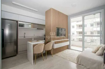 Apartamento mobiliado com 2 dormitórios, sendo 1 suíte, no bairro humaitá com vaga/sacada e churrasqueira interna!