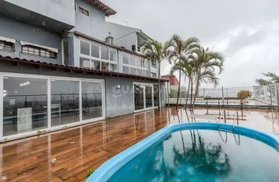 Casa em condomínio fechado com 3 quartos para alugar na Rua Alcebíades Antônio dos Santos, Nonoai, Porto Alegre