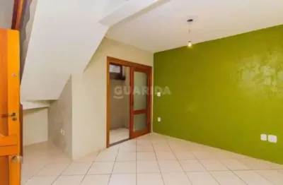 Casa em condominio fechado com 2 dormitórios, sendo 1 suíte, para alugar no bairro guarujá.